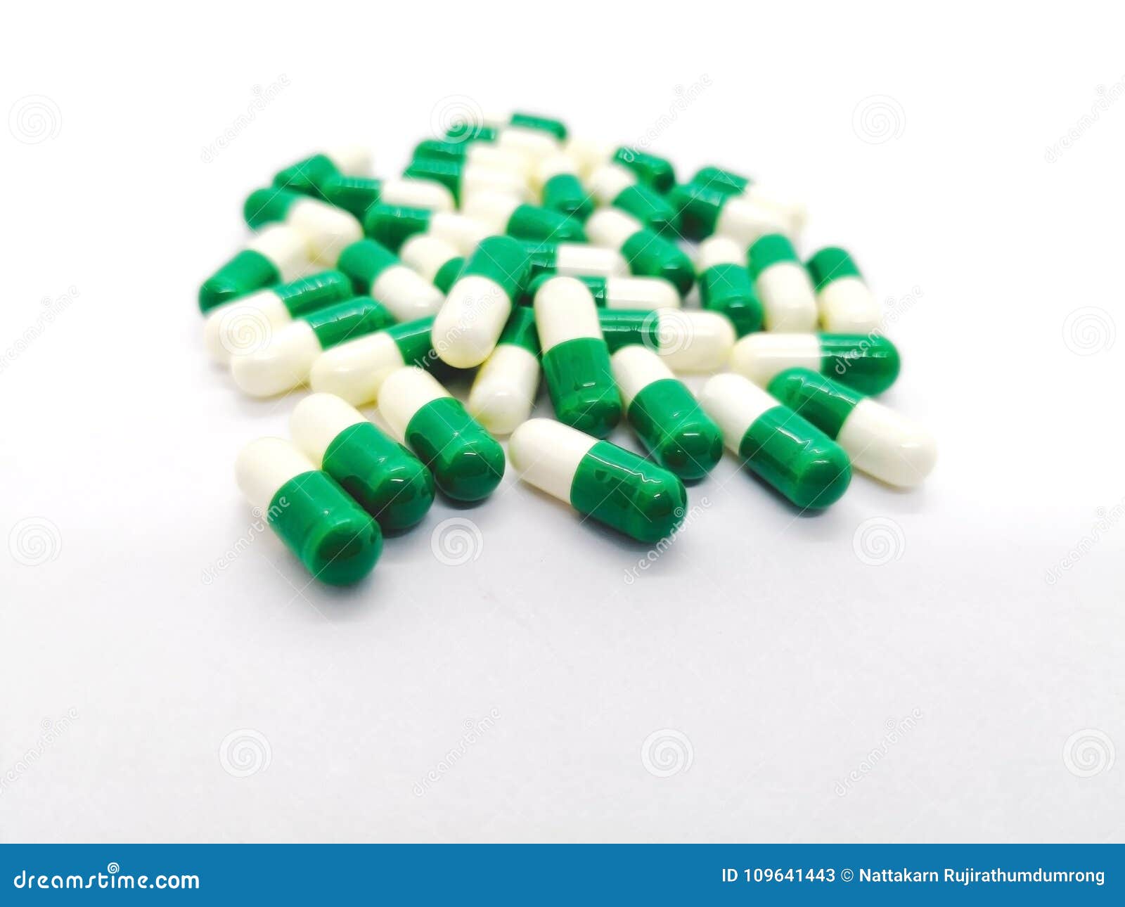 Medication And Healthcare Concept Many White Green Capsules Of Stock Image Image Of Doctor Green