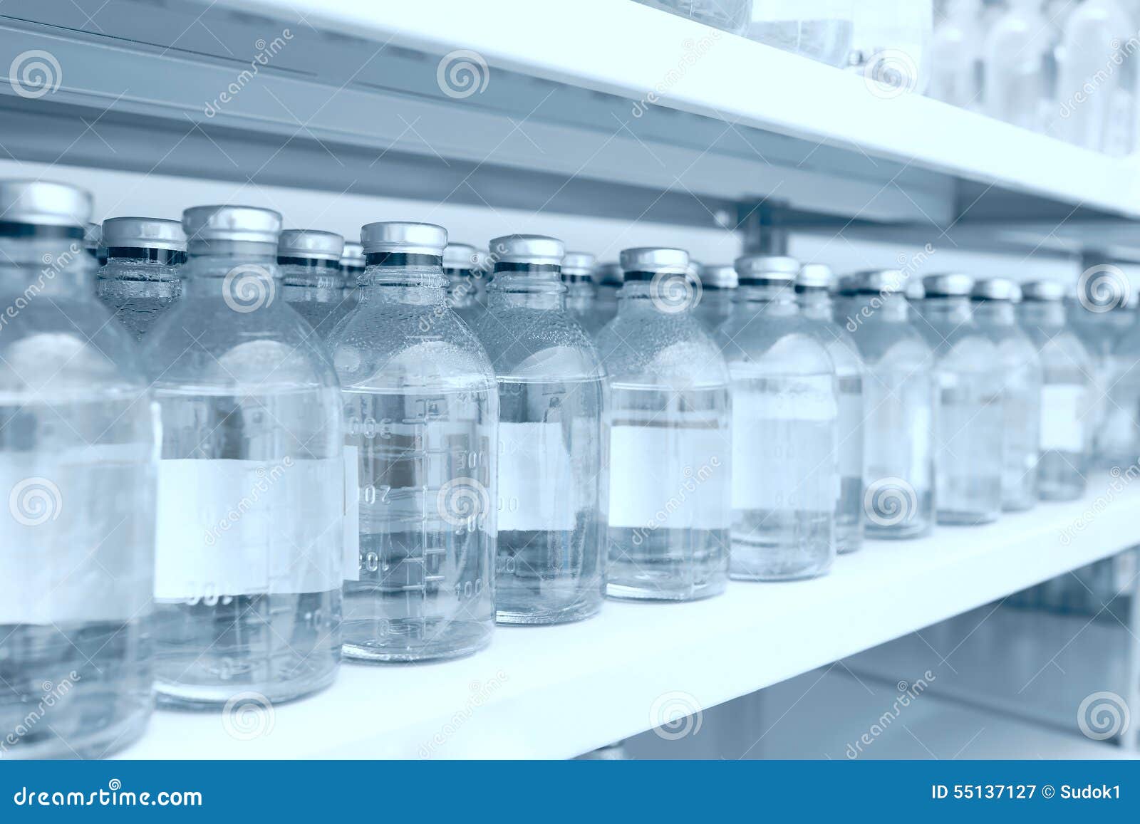 Medicine Bottles in Row on Storage Shelf Stock Image - Image of