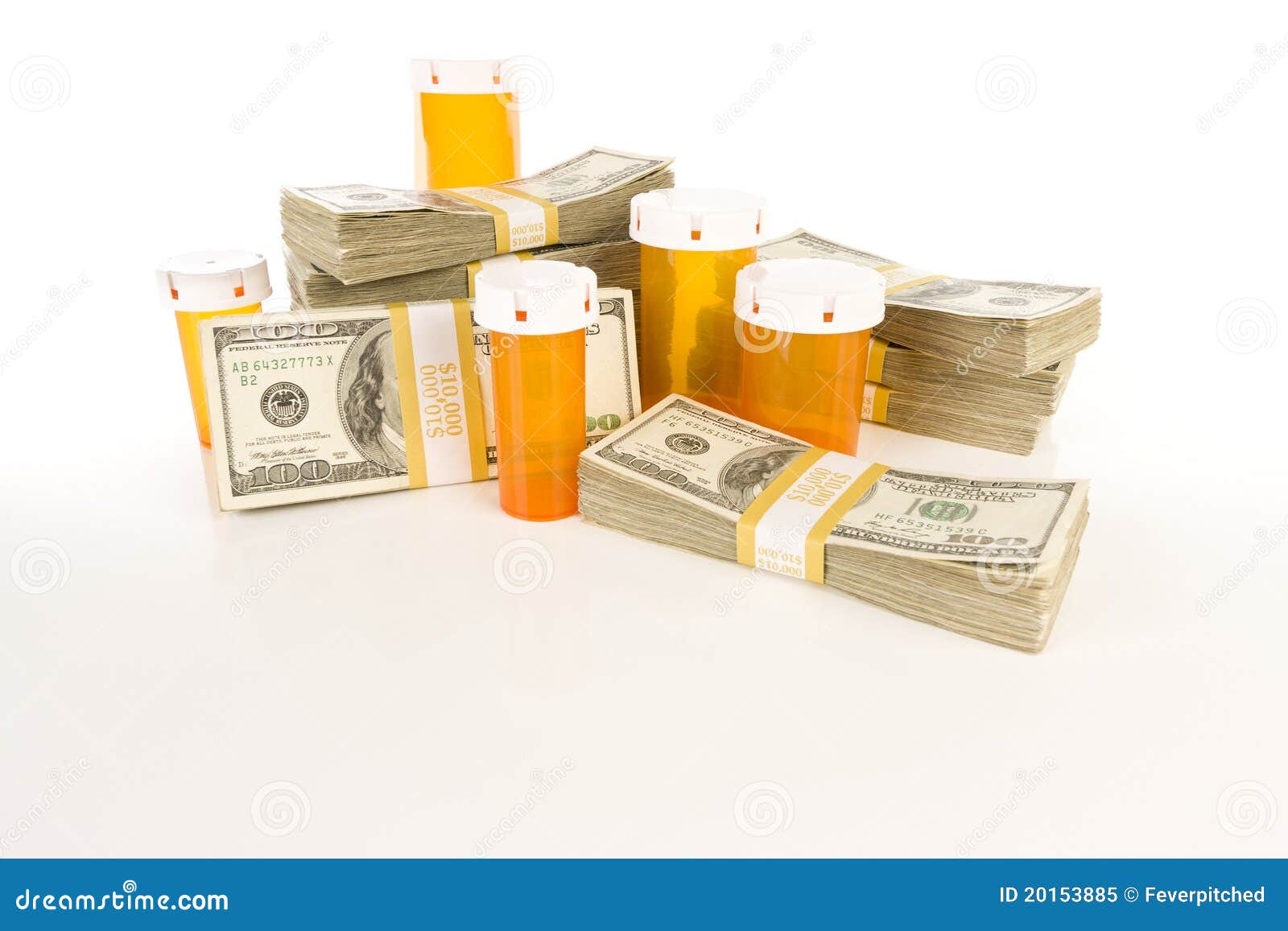 medicine bottles and stacks of hundreds of dollars