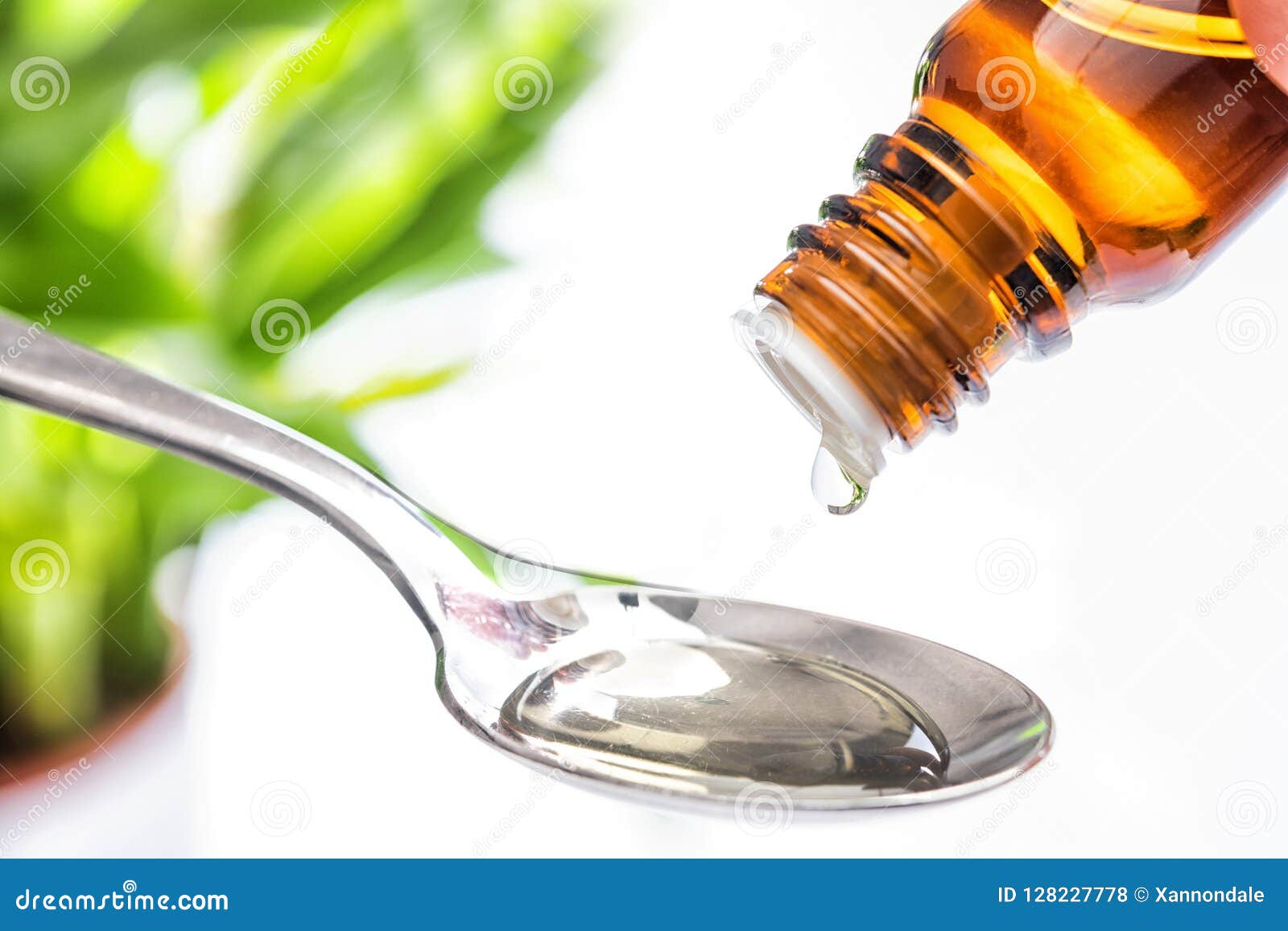 medicine drops with spoon