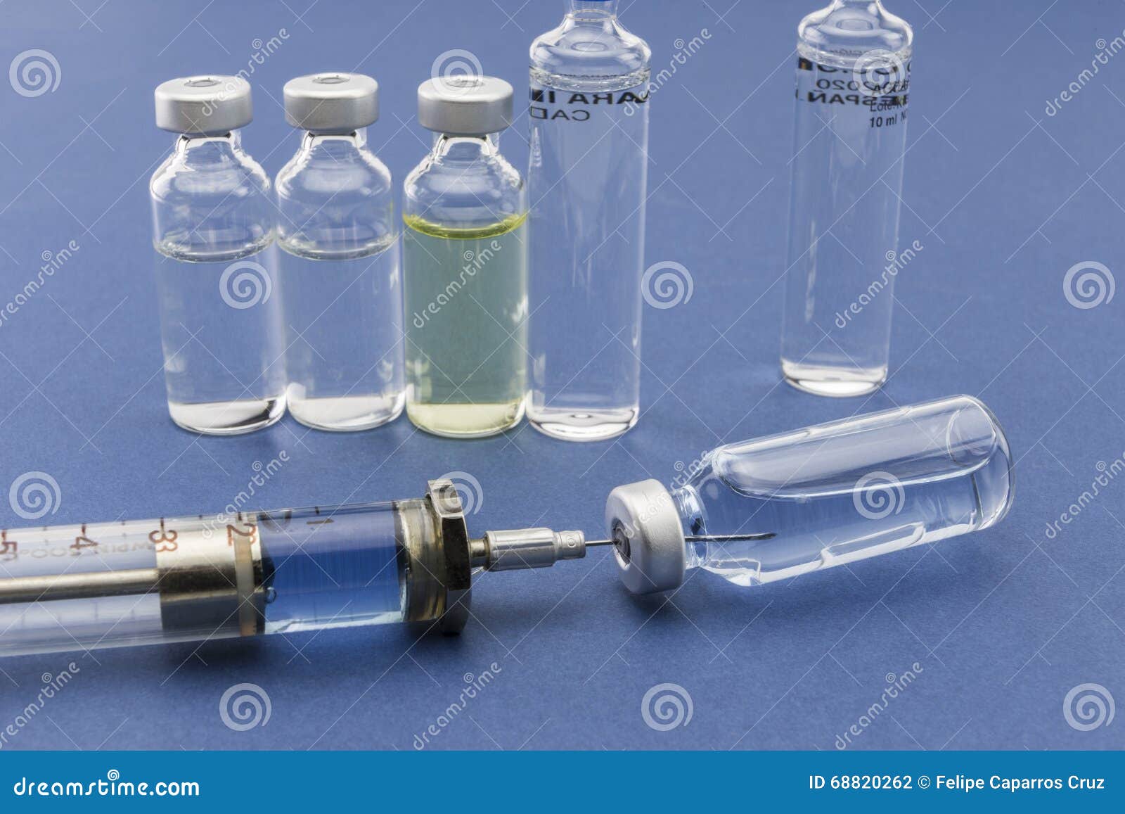 Medicine vials and syringe stock photo. Image of exam 68820262