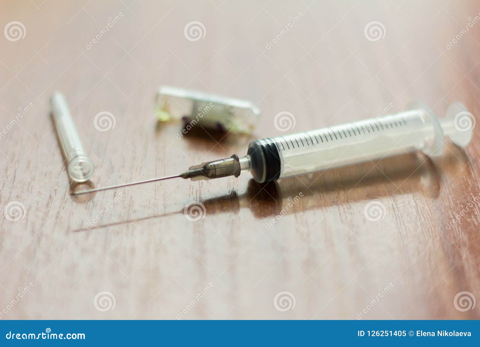 Medicines, Injectable Ampoules and Syringe on the Table Stock Image