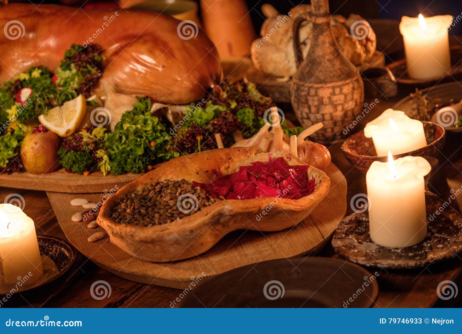 medieval ancient kitchen table with typical food in royal castle.