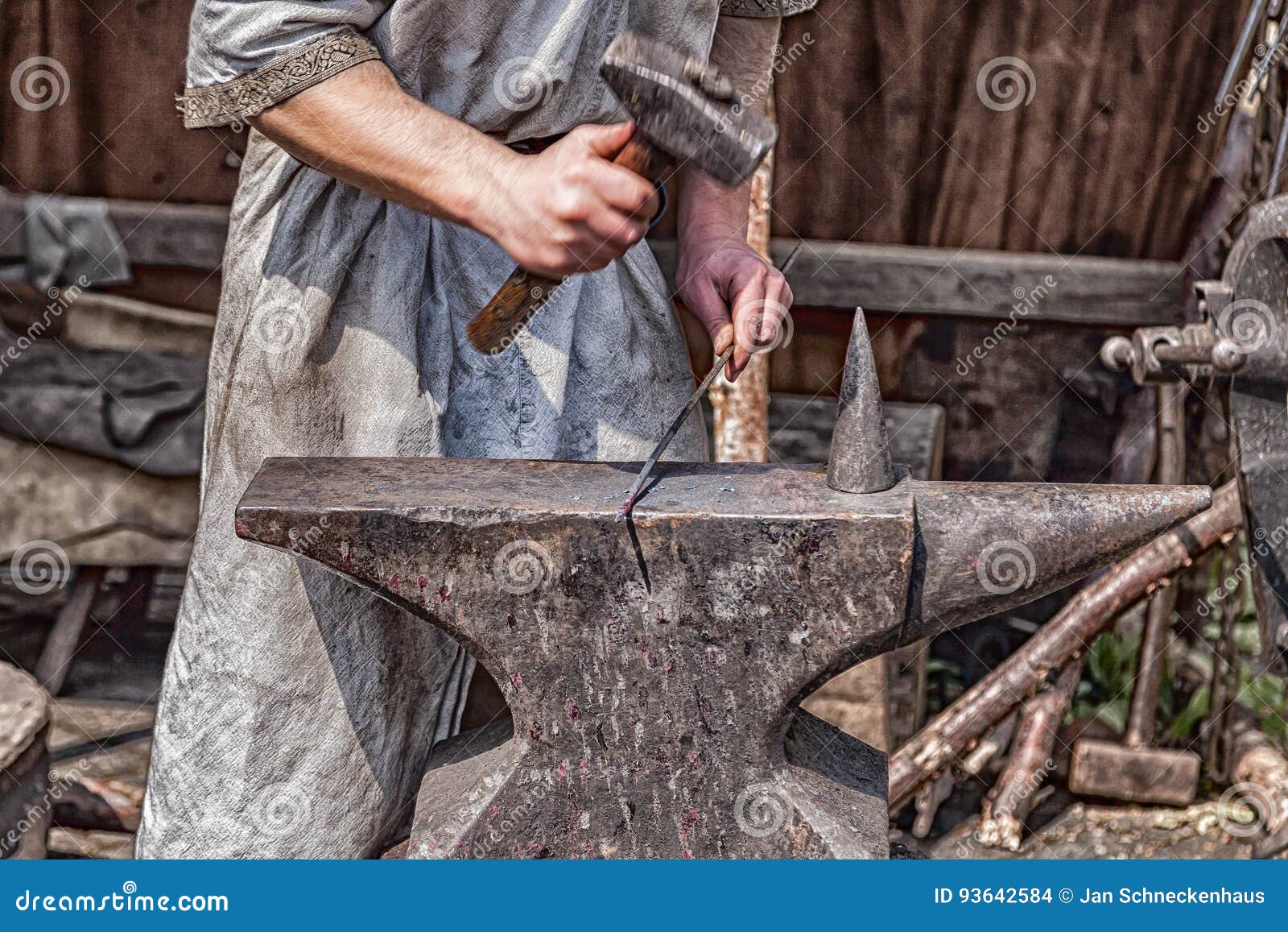 Medieval Blacksmith Shop. Tools And Weapons For Sale Stock Photography