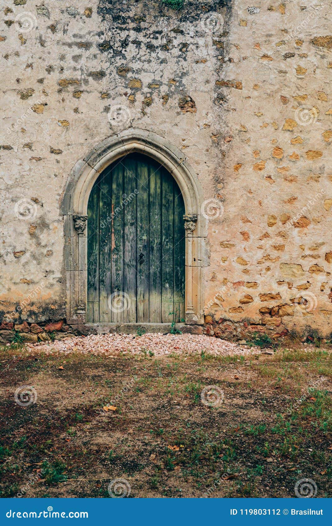 medieval door at 12th-century convent of tomar constructed by the knights templar - tomar, portugal - unesco world