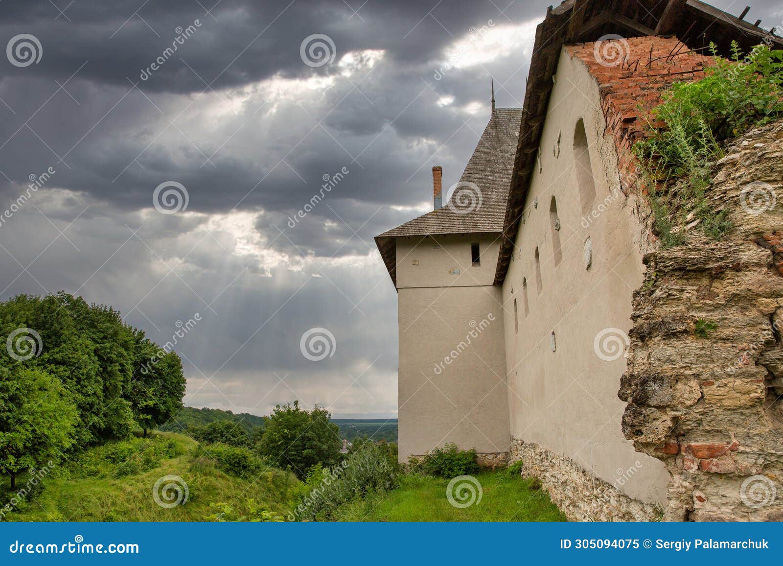 medieval halych castle under stormy sky in ukraine