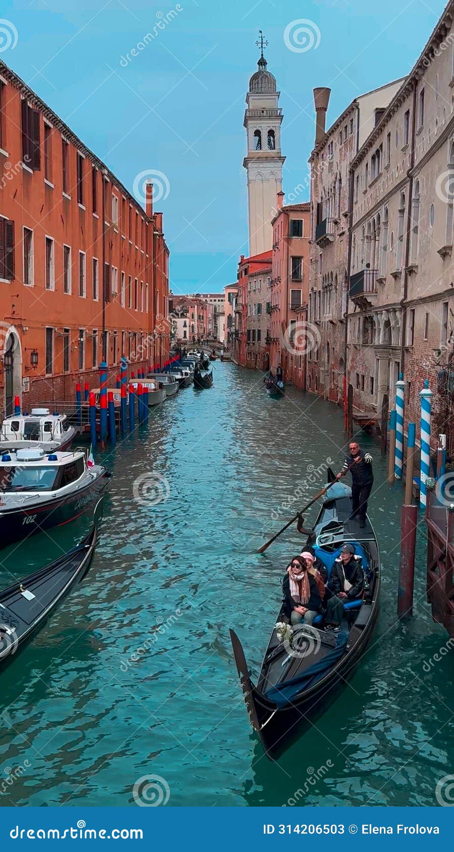 medieval houses, narrow canals, bridges and gondolas in venice, italy, february 10, 2024.