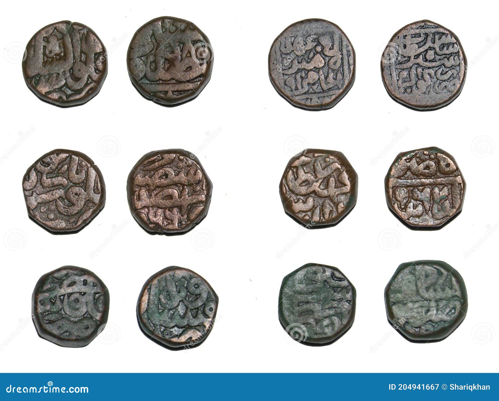 Old Copper Coins Of Ancient Indian Dynasties Stock Photo old-copper-coins-of-ancient-indian-dynasties-stock-photo
