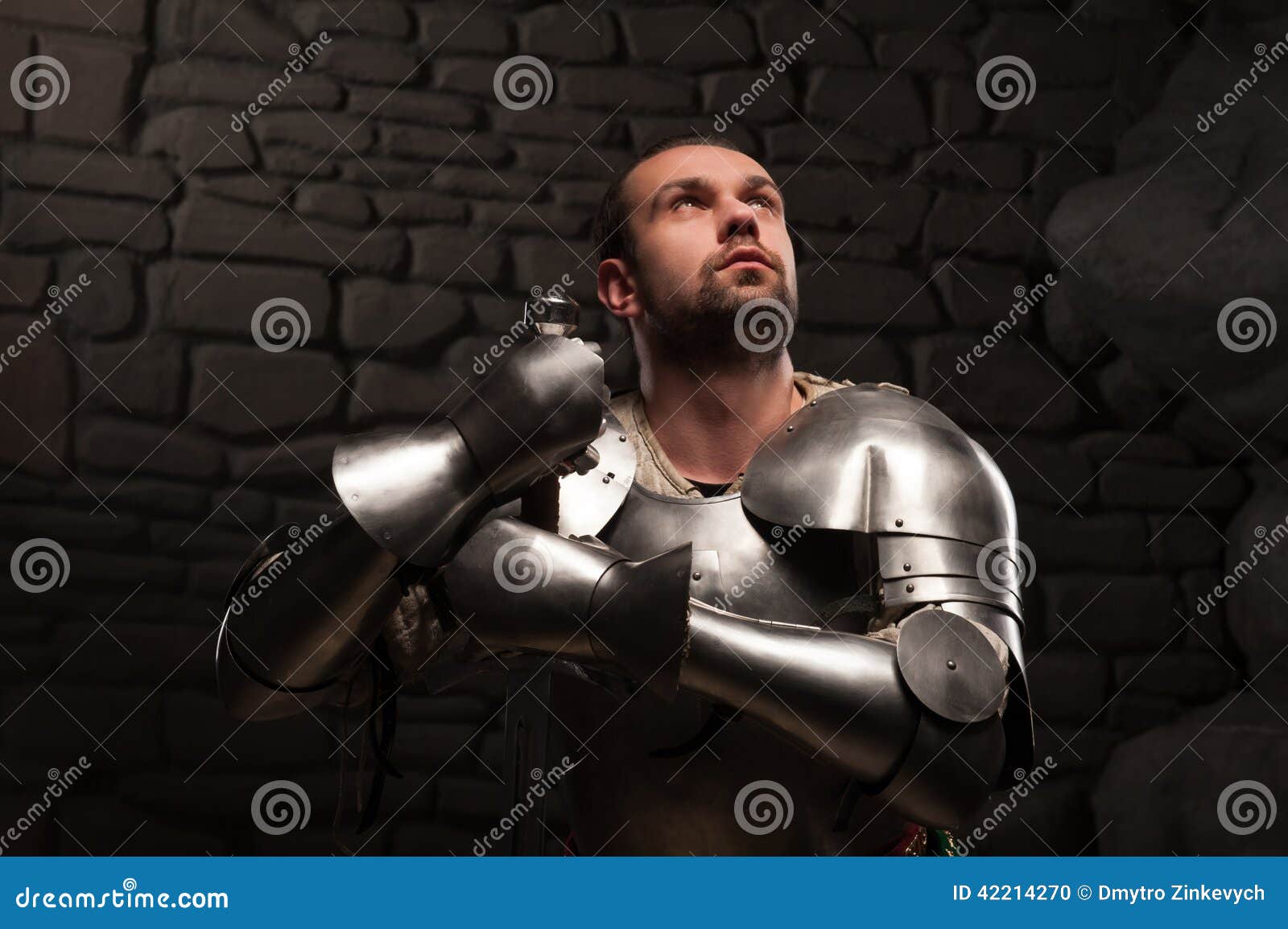Medieval Knight Kneeling With Sword Stock Photo Image 42214270