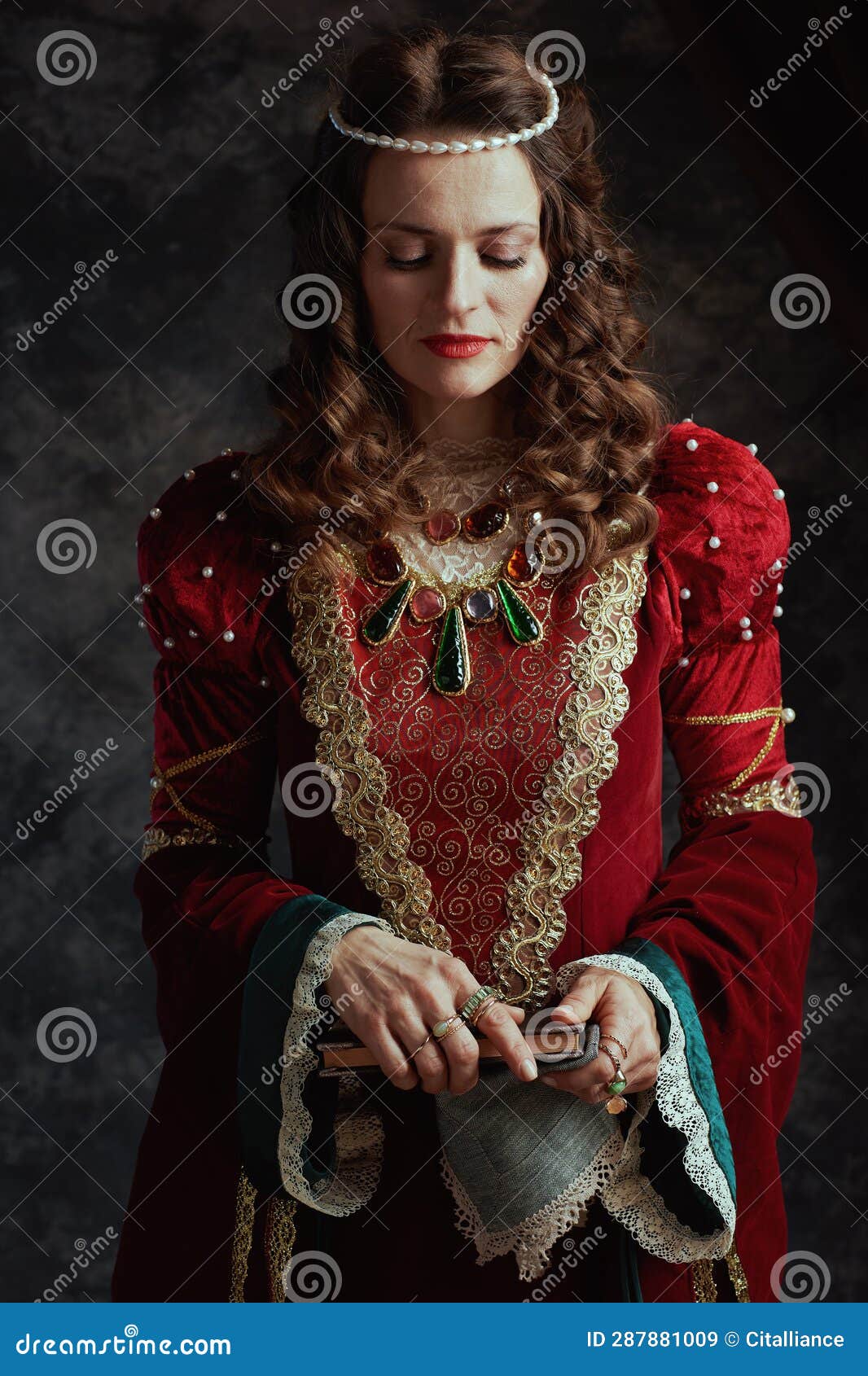 Medieval Queen in Red Dress with Book and Handkerchief Stock Image ...