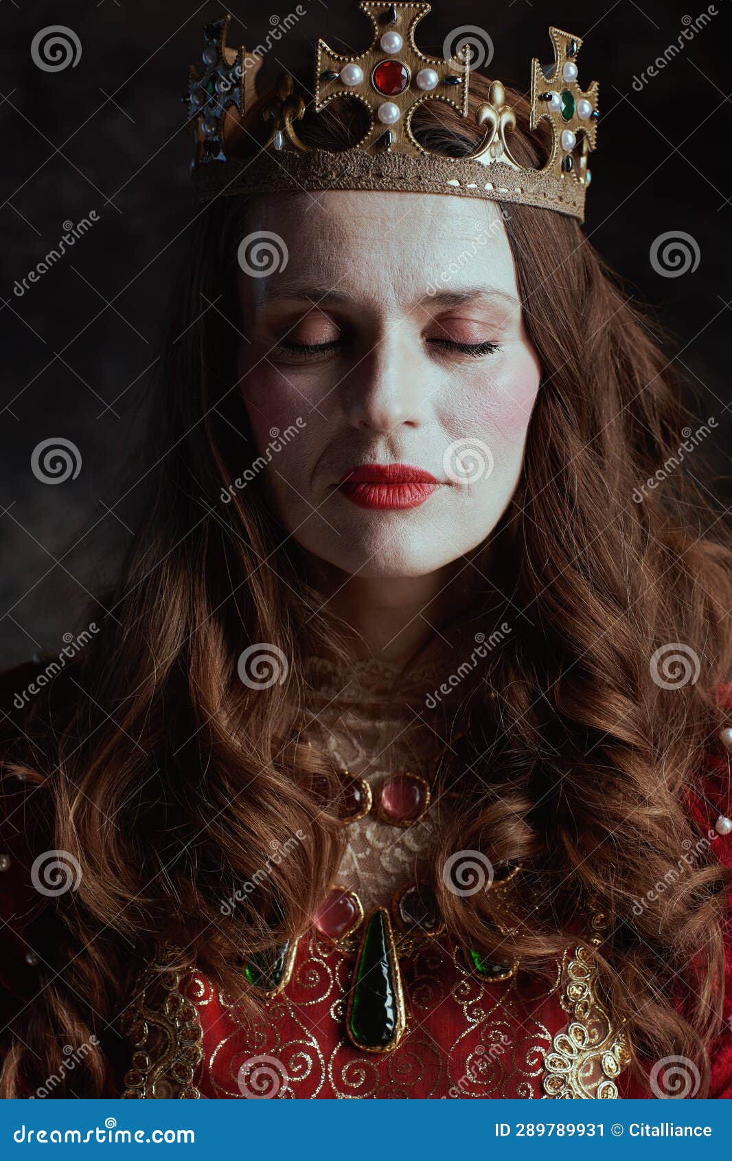 Medieval Queen in Red Dress with White Makeup and Crown Stock Image ...