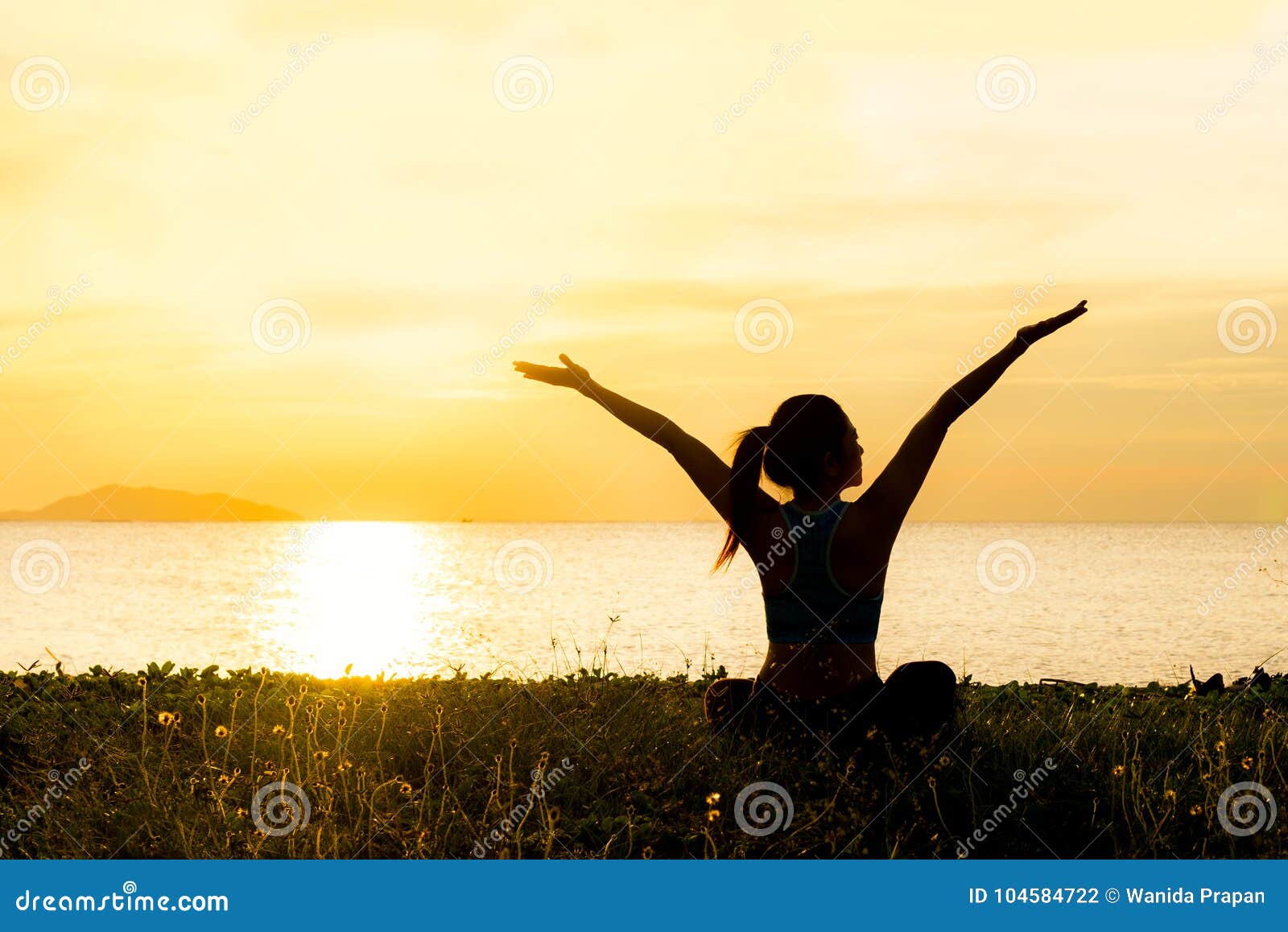 meditation yoga lifestyle woman silhouette on the sea sunset, relax vital.