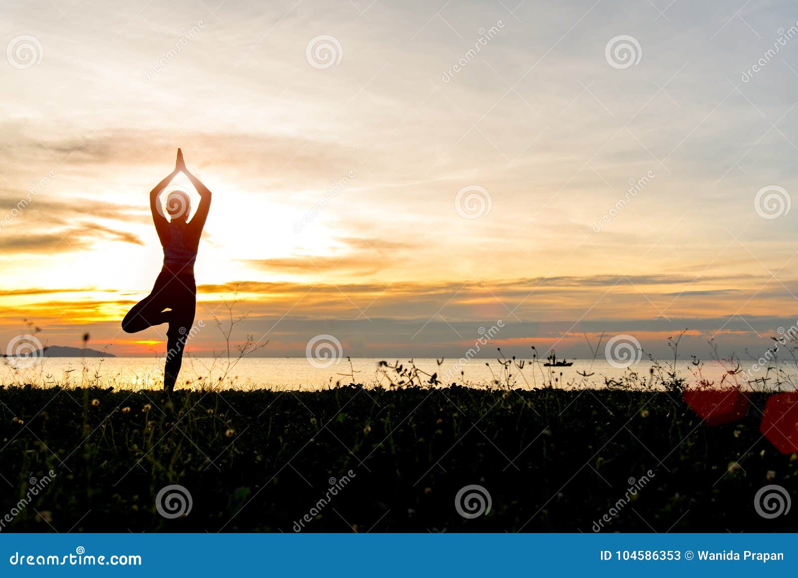 meditation yoga lifestyle woman silhouette on the sea sunset, relax vital