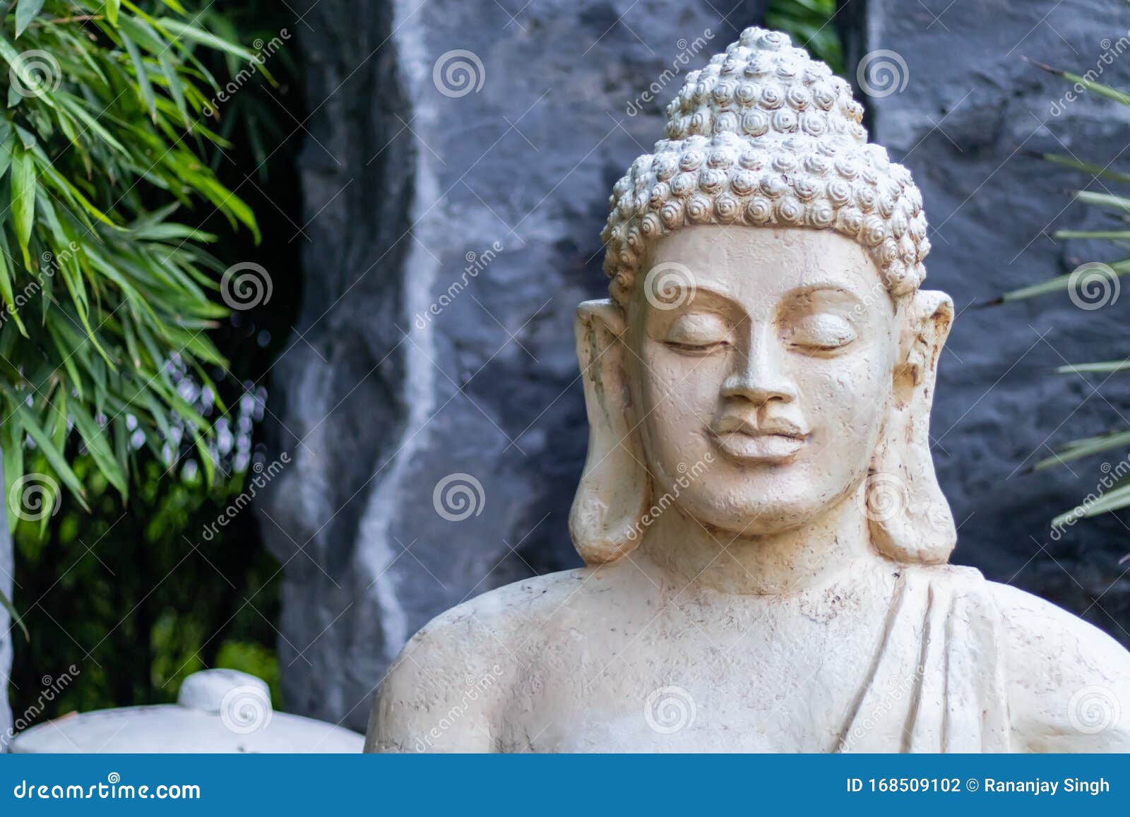 Meditative Pose of a Buddha Statue Face Closeup. Peace Concept ...