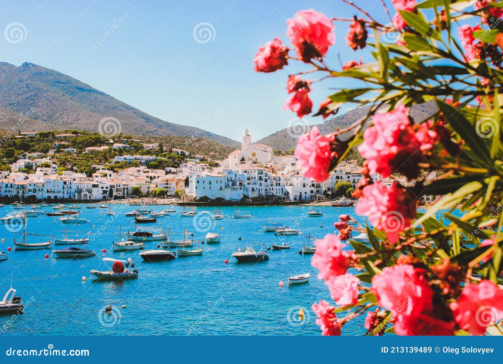 mediterranean coast. white houses, turquose sea and yachts. cadaquÃÂ©s spain.