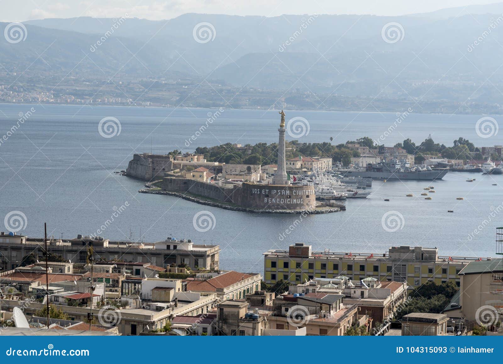 view across the straits of messina from the sacrario militare cristo re messina italy