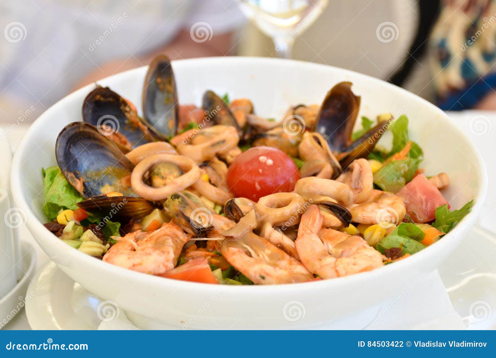 Mediterranean Dish with Calamari Squids, Clams and Tomatoes Stock Photo