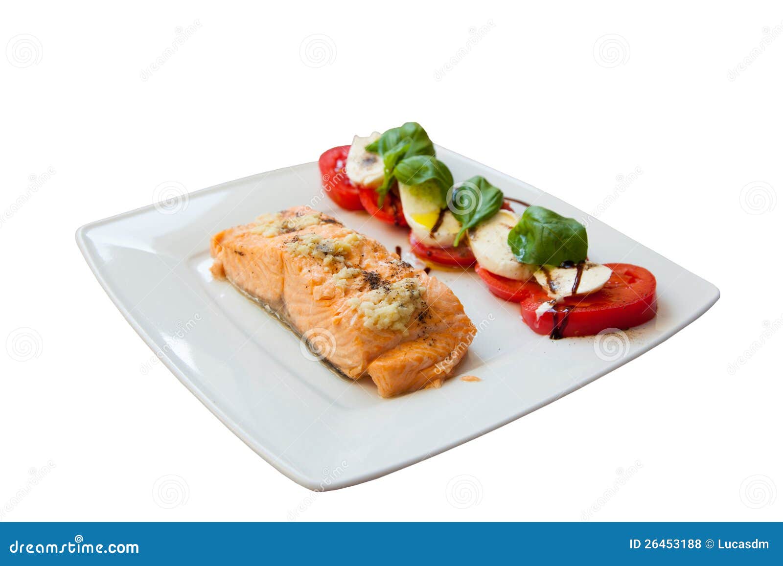 Mediterranean dish ver 2. Salmon with tomatoes and basil. Greece. The view from the top. White background.