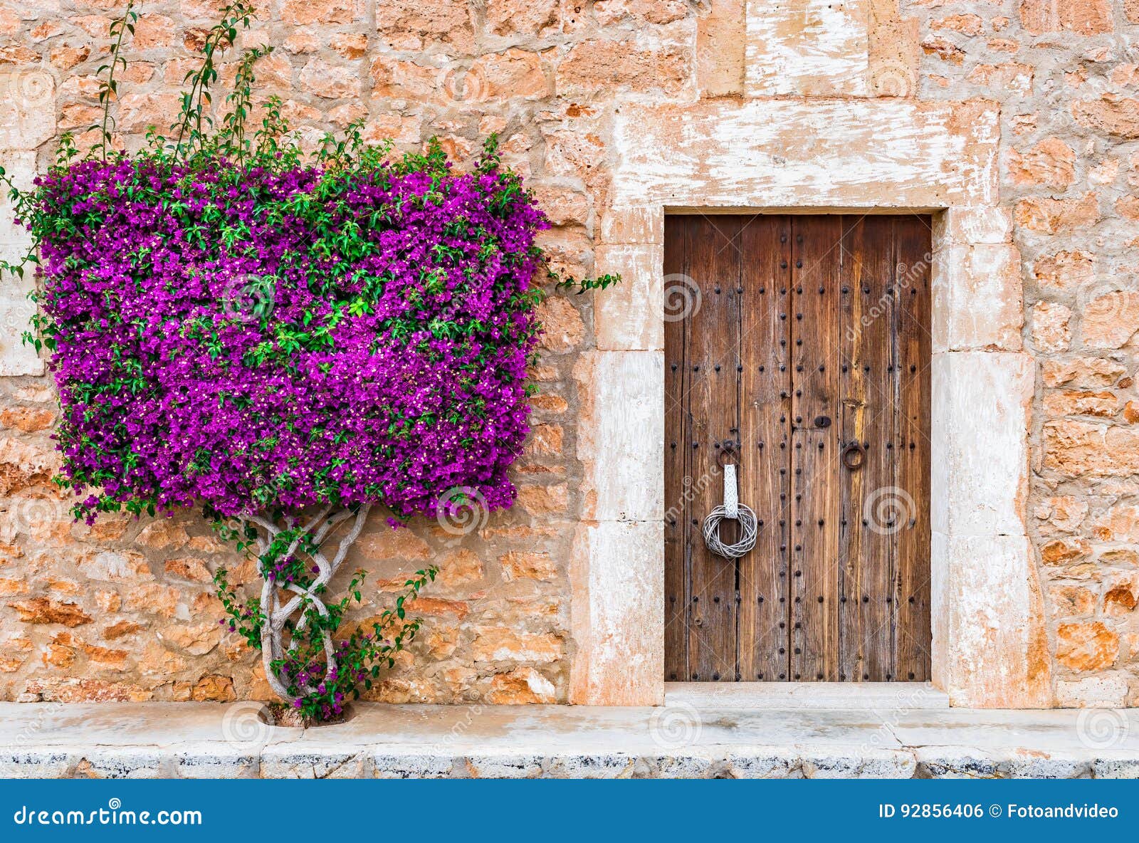 Mediterranean House Wooden Door and Bougainvillea Stock Photo - Image ...