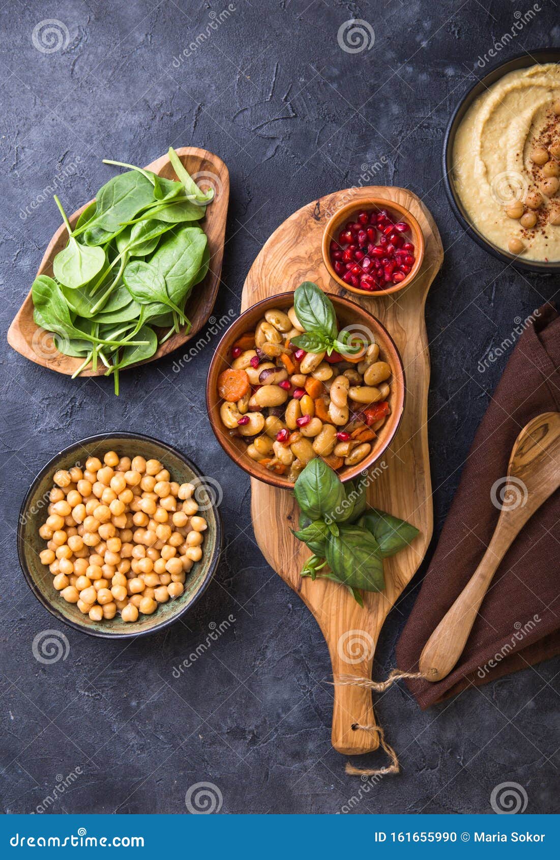 Mediterranean Mezze Board with Hummus, Beans, Spinach . Top View Stock