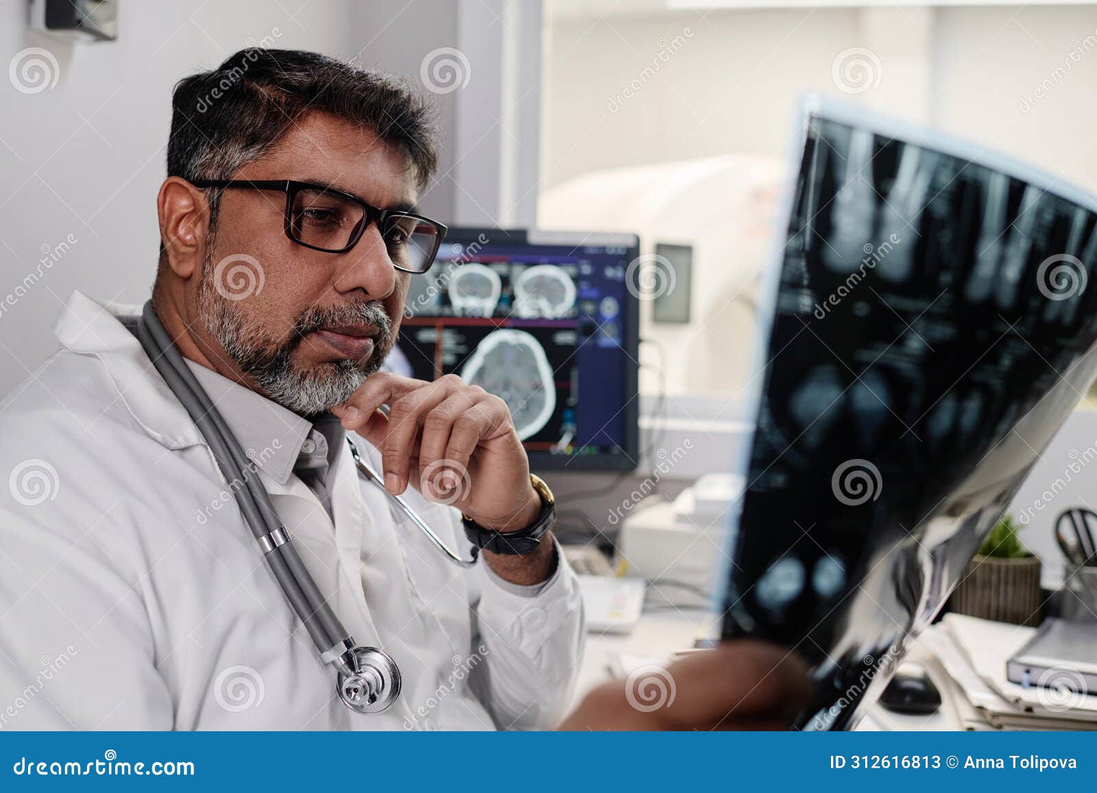 radiographer checking x-ray image
