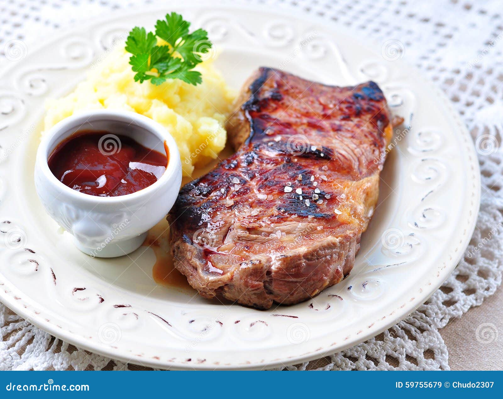 Medium Rare Grilled Beef Steak with Mashed Potatoes and Barbecue Sauce