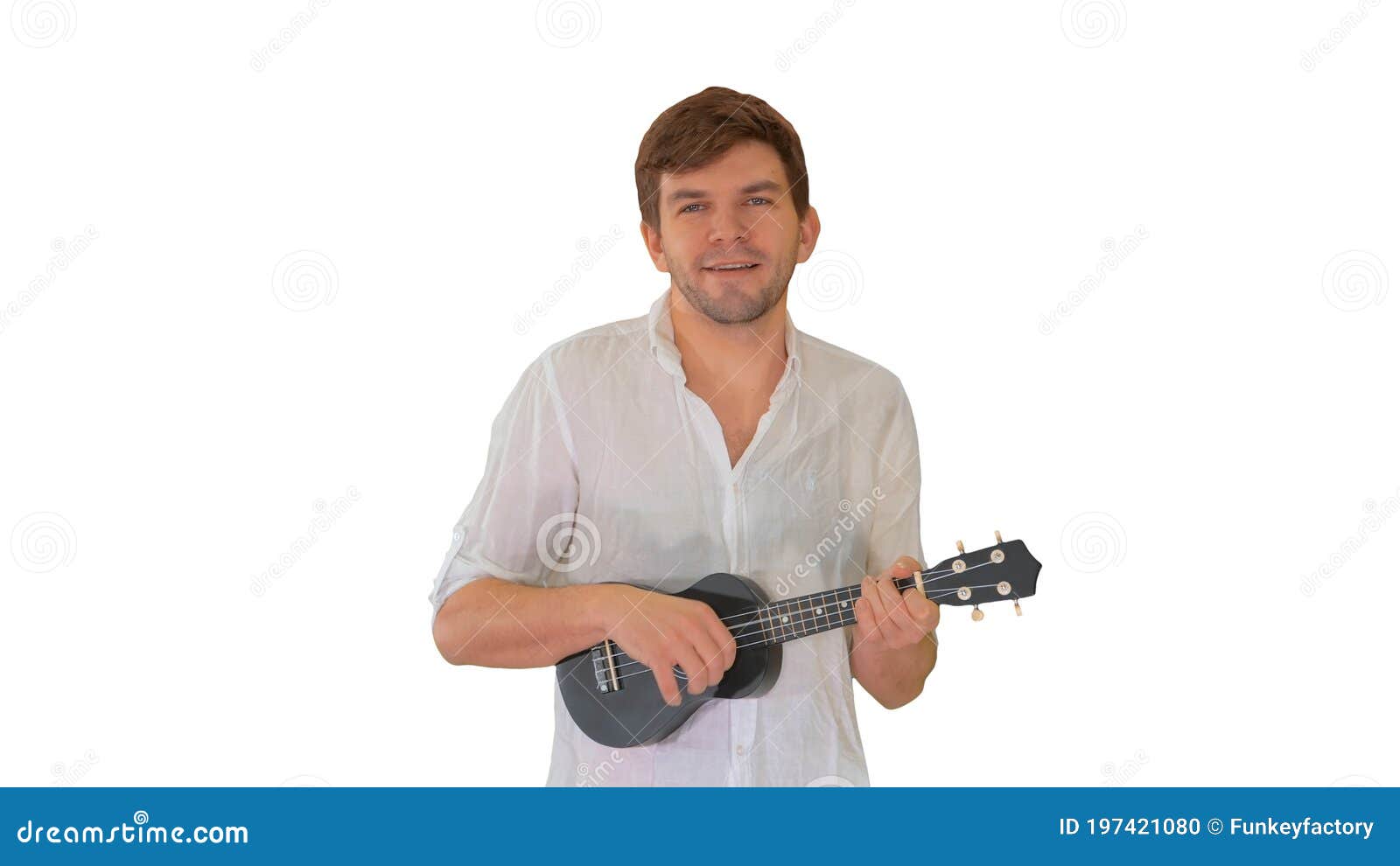 Young Man Playing Ukulele and Signing while Walking and Looking Stock Photo Image of small