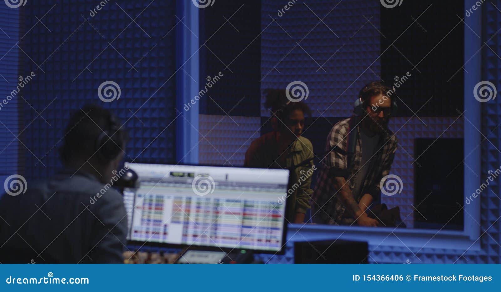 Foley Artists and Sound Engineer Working in Studio Stock Photo Image