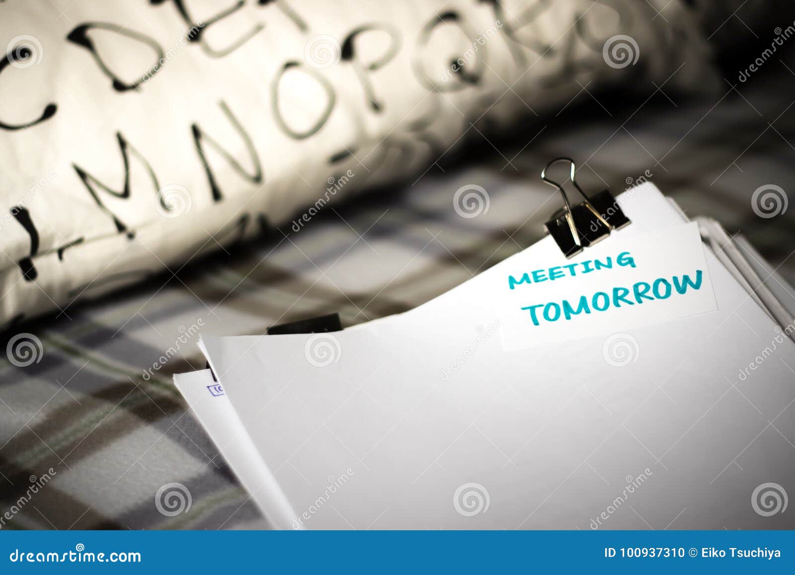 Meeting Tomorrow; Stack of Documents. Working or Studying at Bed Stock