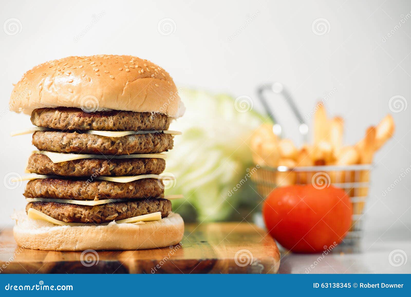 Mega Cheeseburger stock image. Image of huge, fries, concept 63138345
