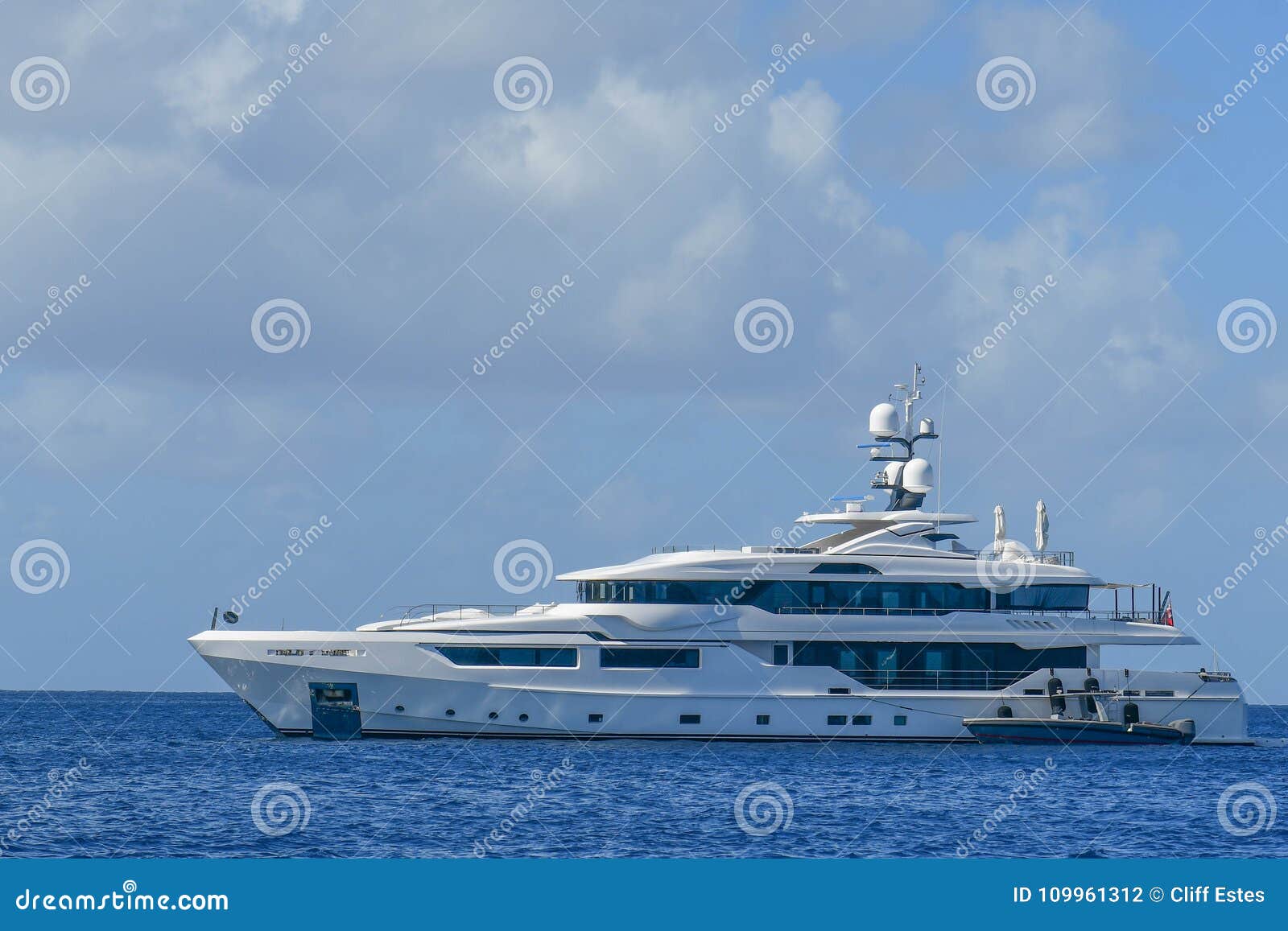 megayacht and tender in caribbean islands