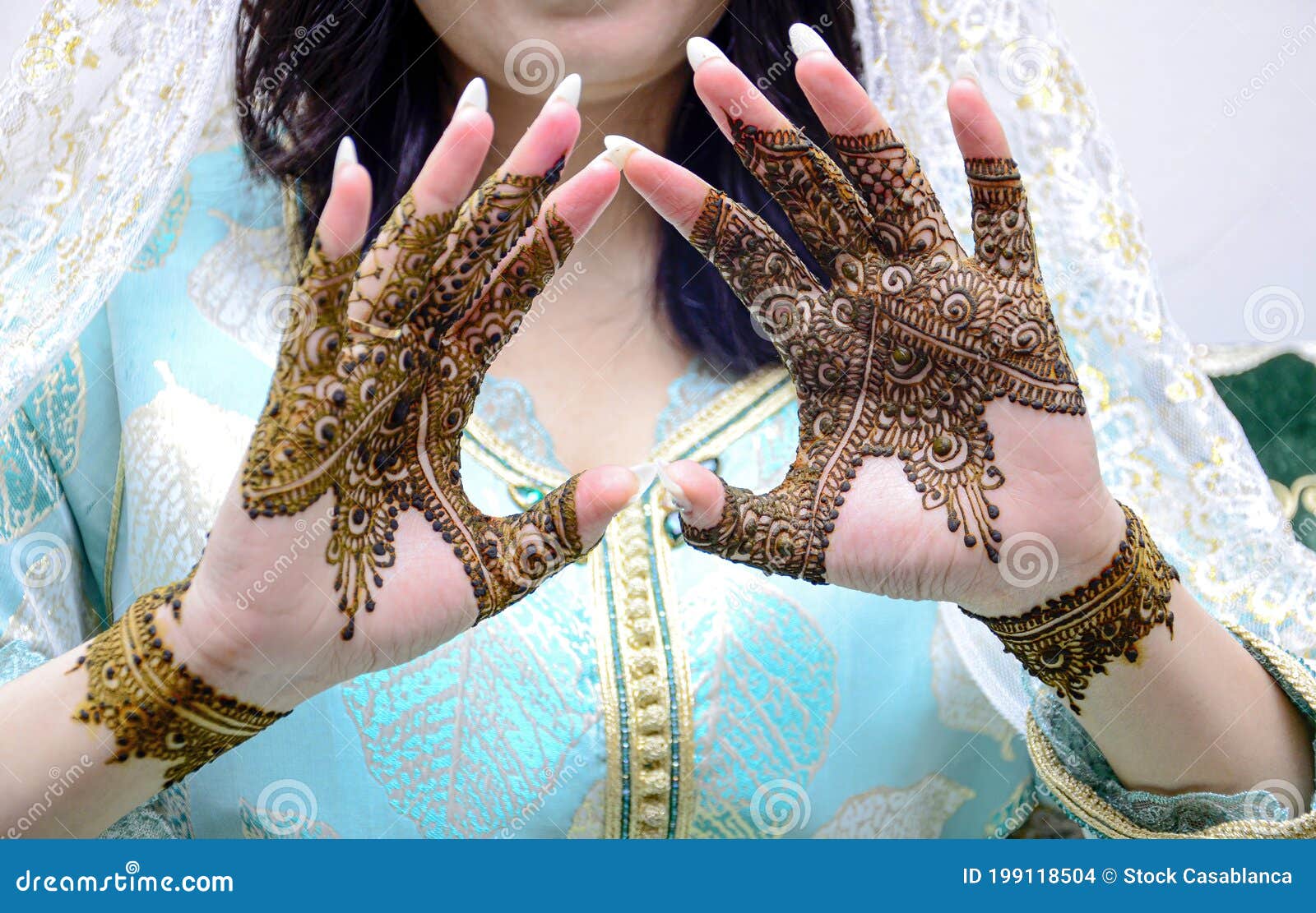 Woman Hand with black mehndi tattoo Stock Photo by wirestock | PhotoDune