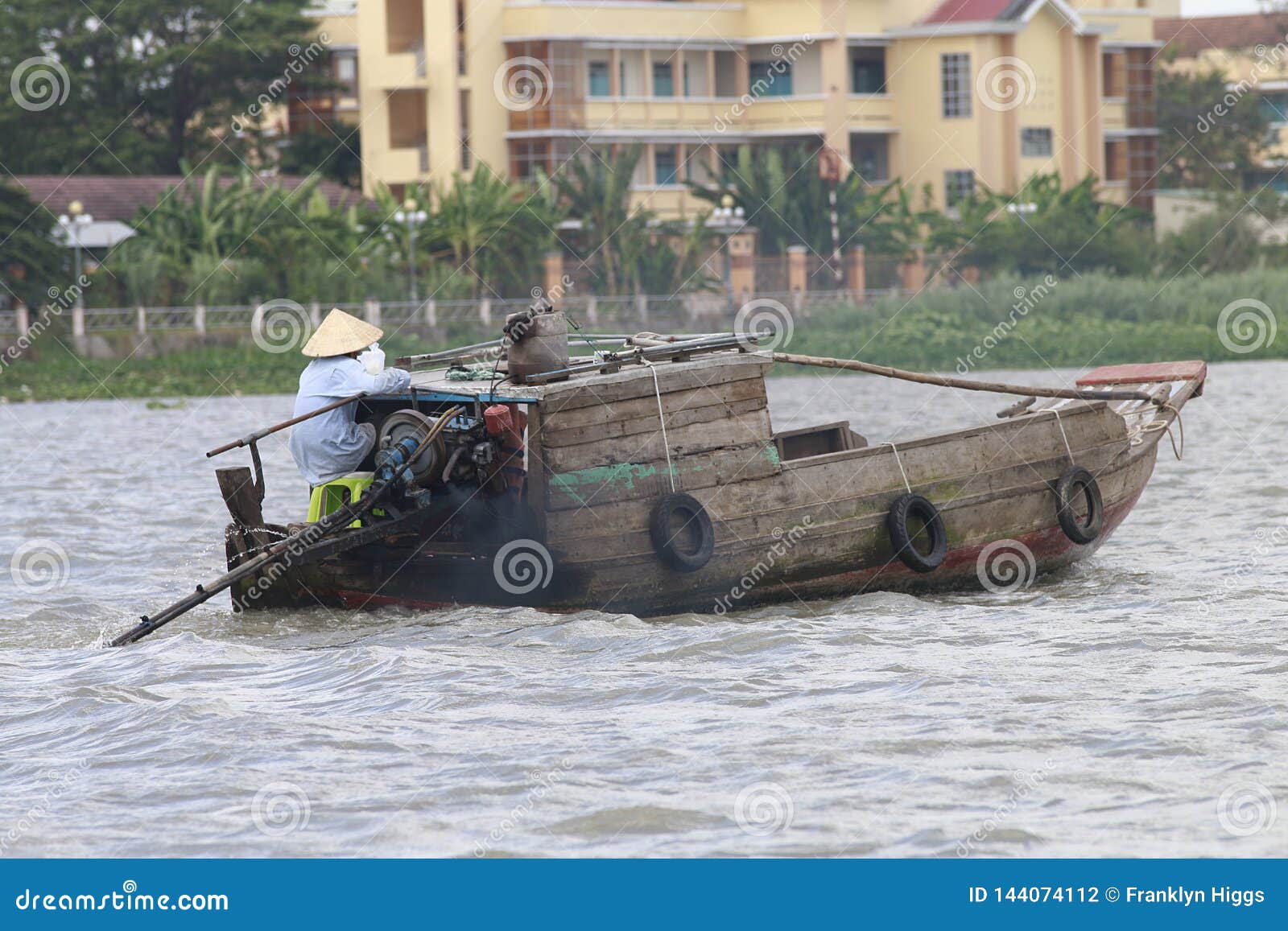 a vibrant wet boat market on the makong delta  souther part of the country where the major industry is farming