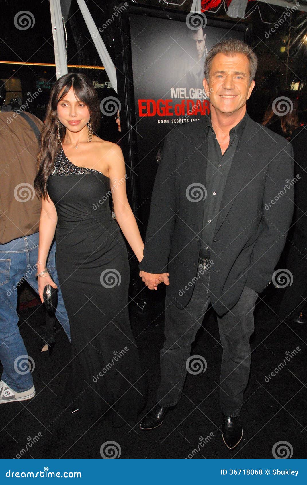 Mel Gibson, Oksana Grigorieva, the Edge, Borde Foto de archivo
