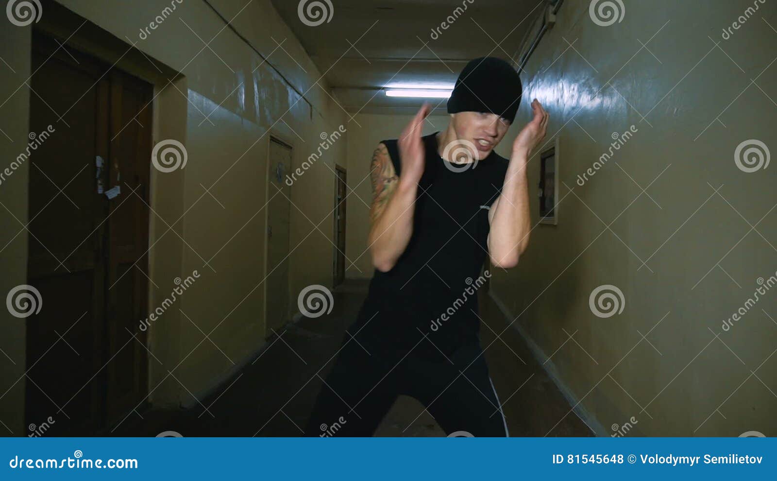 Melee Attack a Young Man in an Abandoned Corridor Stock Footage Video