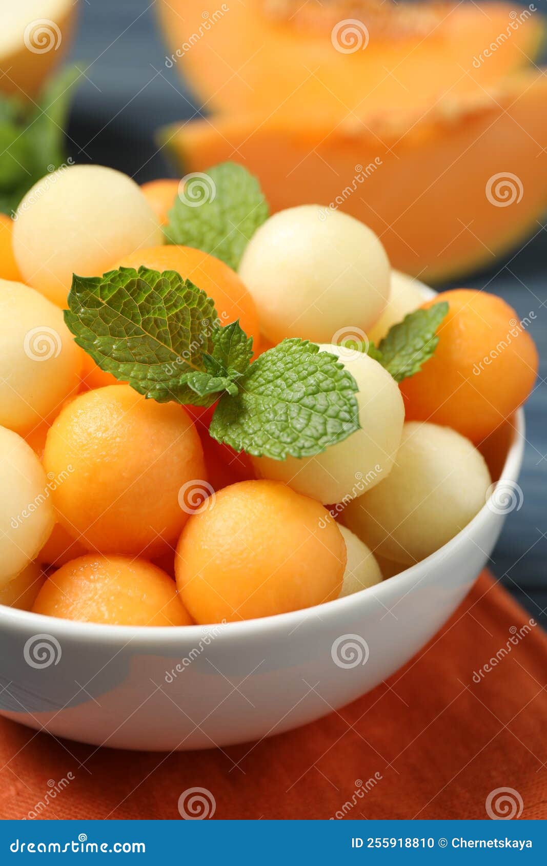 Melon Balls and Mint in Bowl on Table, Closeup Stock Photo Image of