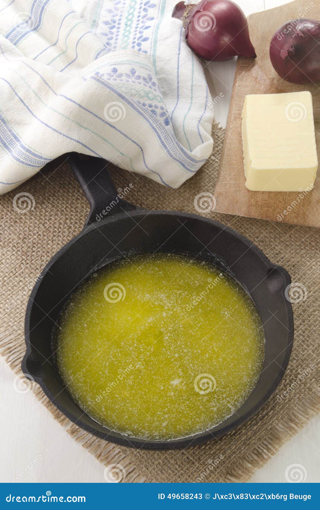 Melted Butter in Cast Iron Pan Stock Image Image of towel, wood 49658243