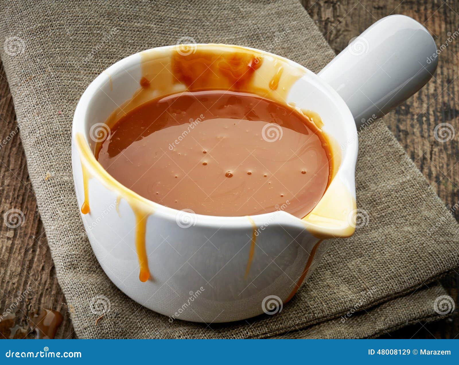 Melted caramel sauce stock image. Image of handle, brown 48008129