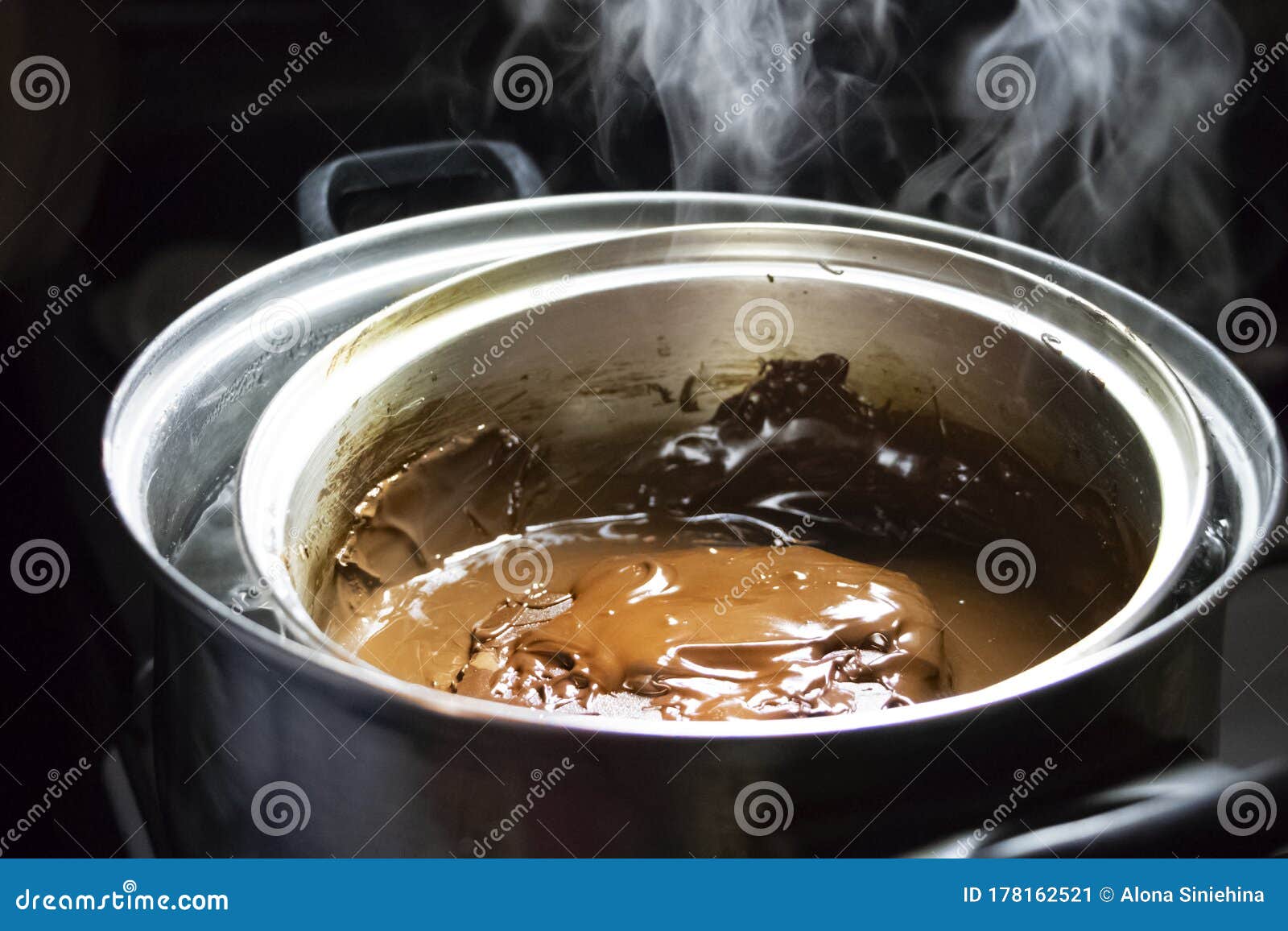 Melted Chocolate in Pan Under a Water Bath. Making Hot Chocolate at