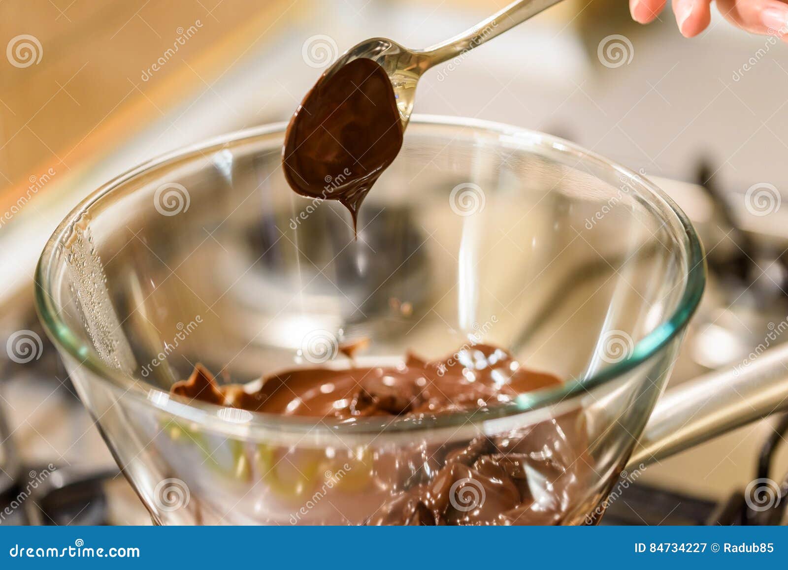 Melting Chocolate on Stove stock image. Image of melting 84734227