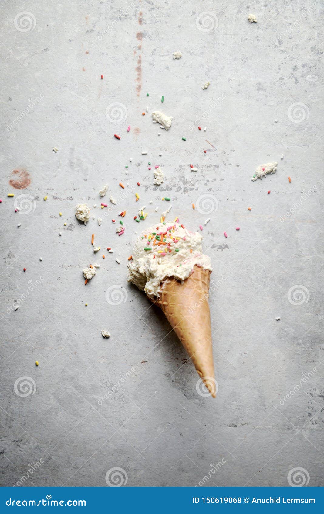 Melting Coconut Ice Cream Scoops and Waffle Cone. Top View Stock Photo