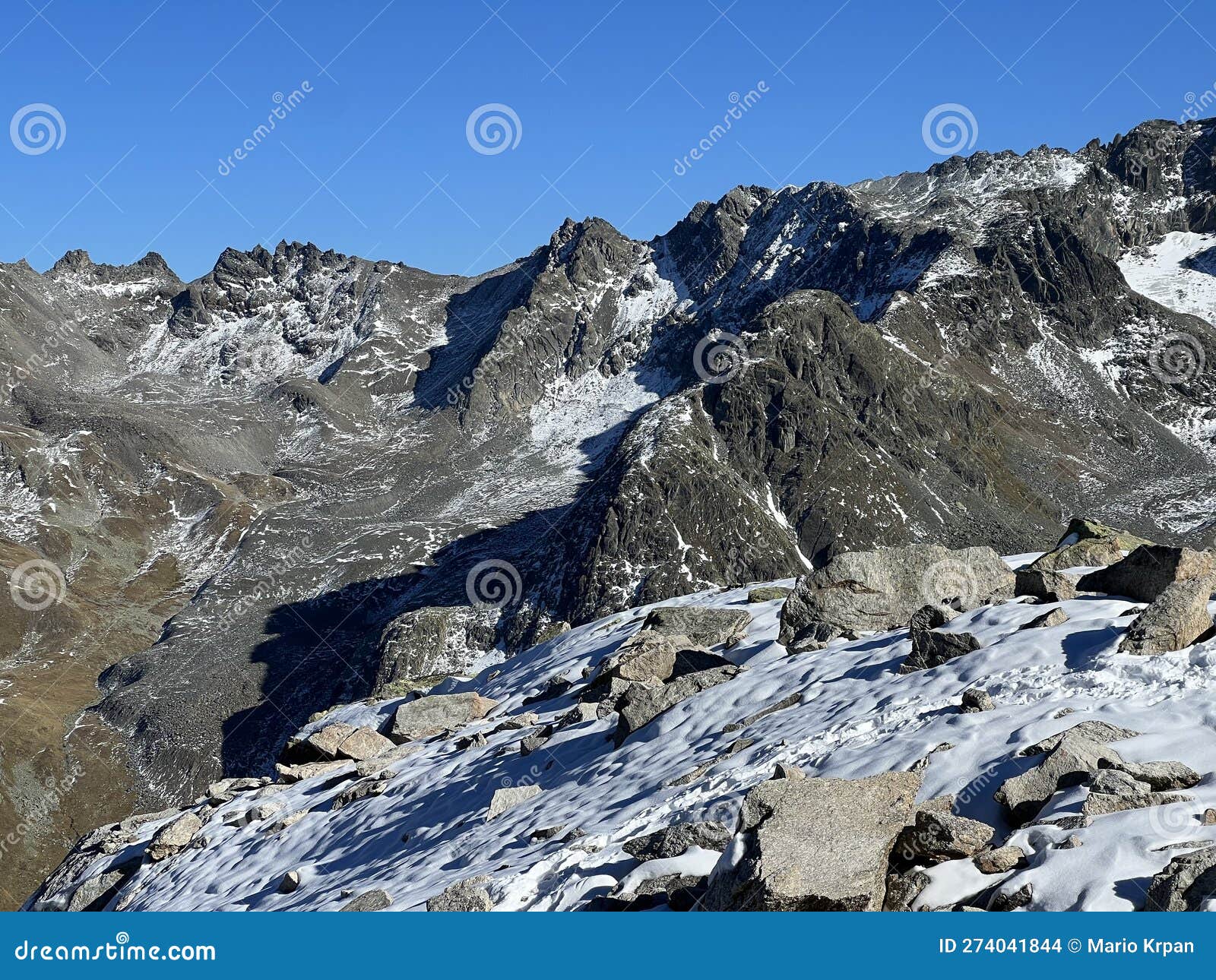 the melting of fresh autumn snow in the wonderful environment of the swiss mountain massif abula alps, zernez