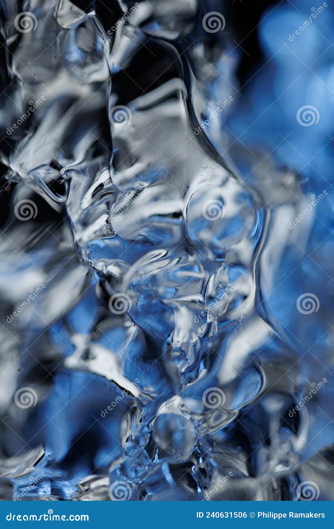 Melting ice water closeup stock photo. Image of bright 240631506