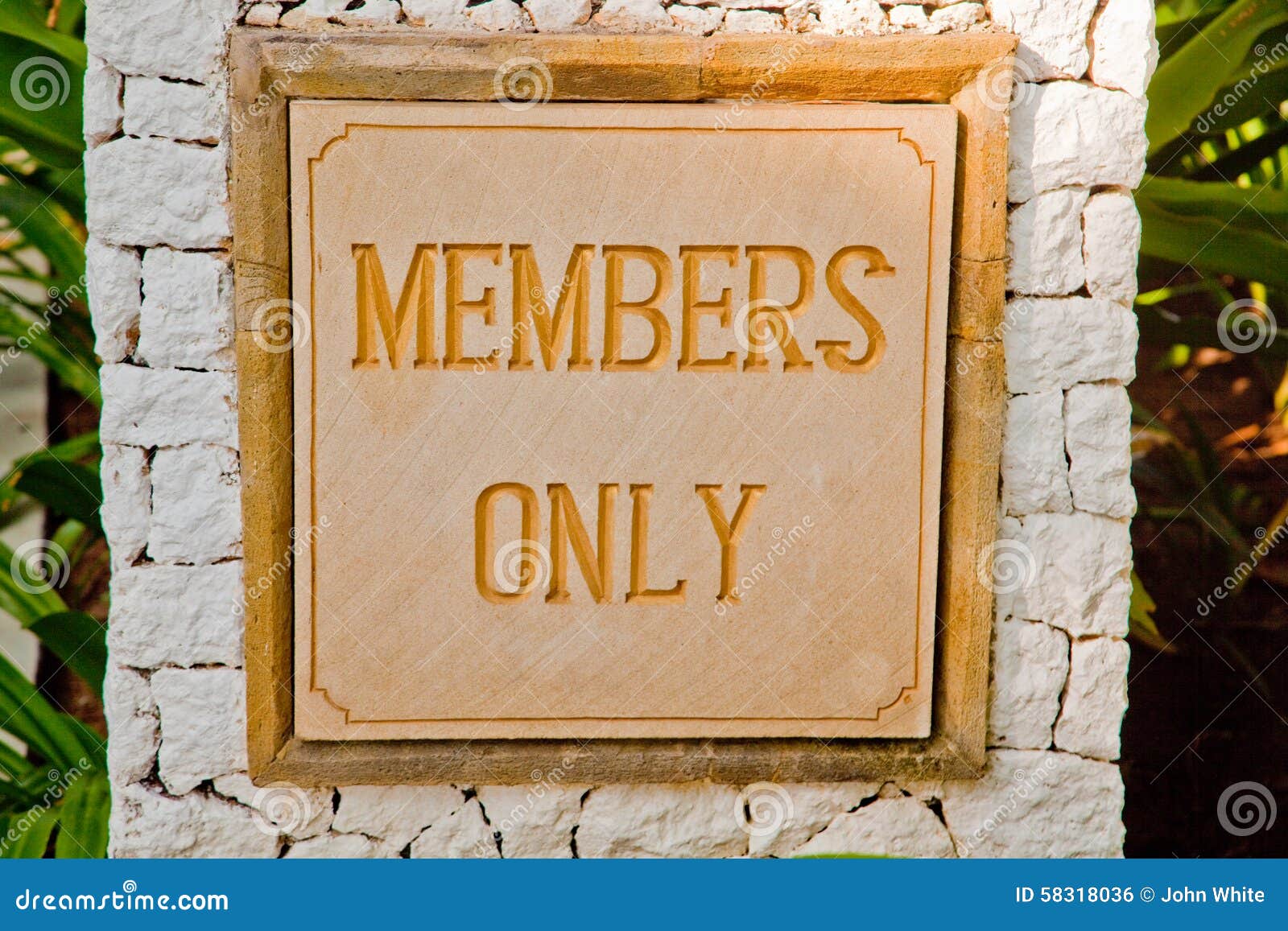 a members only sign at a resort