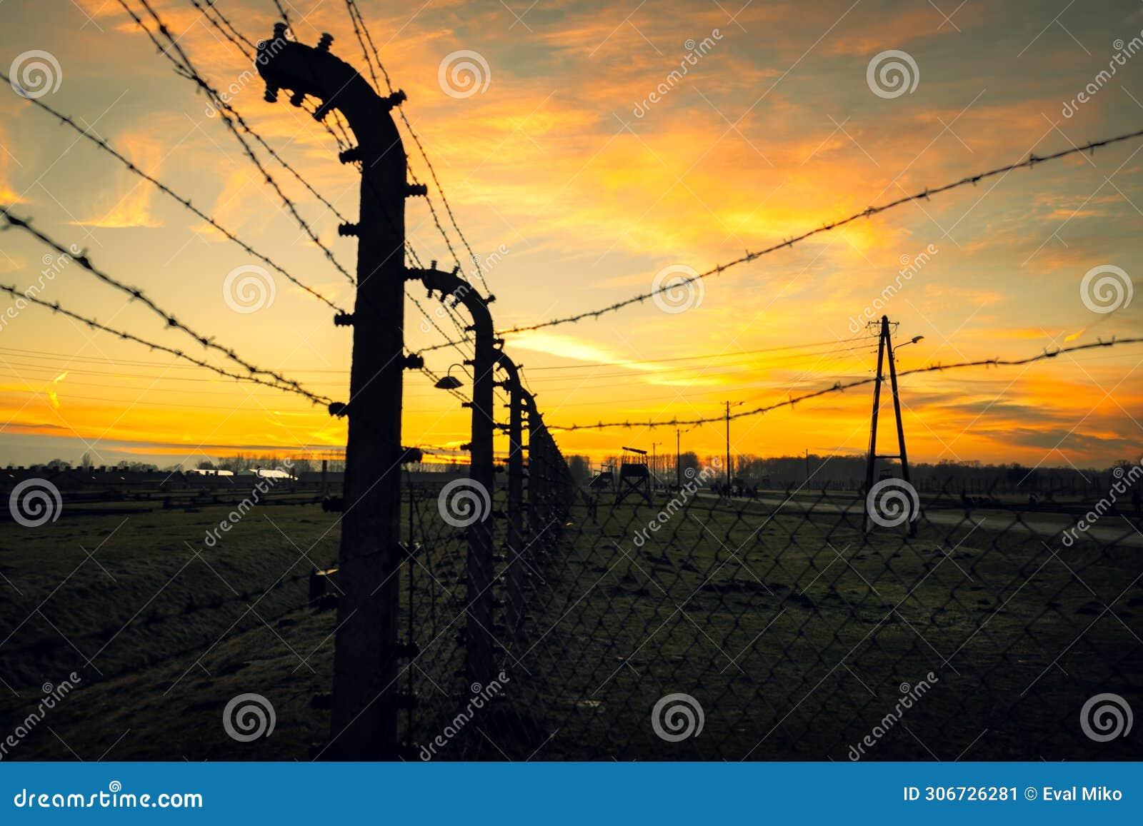 memorial and museum aushwitz-birkenau, former auschwitz nazi death camp in oswiecim, poland. barracks and elecrified fencing