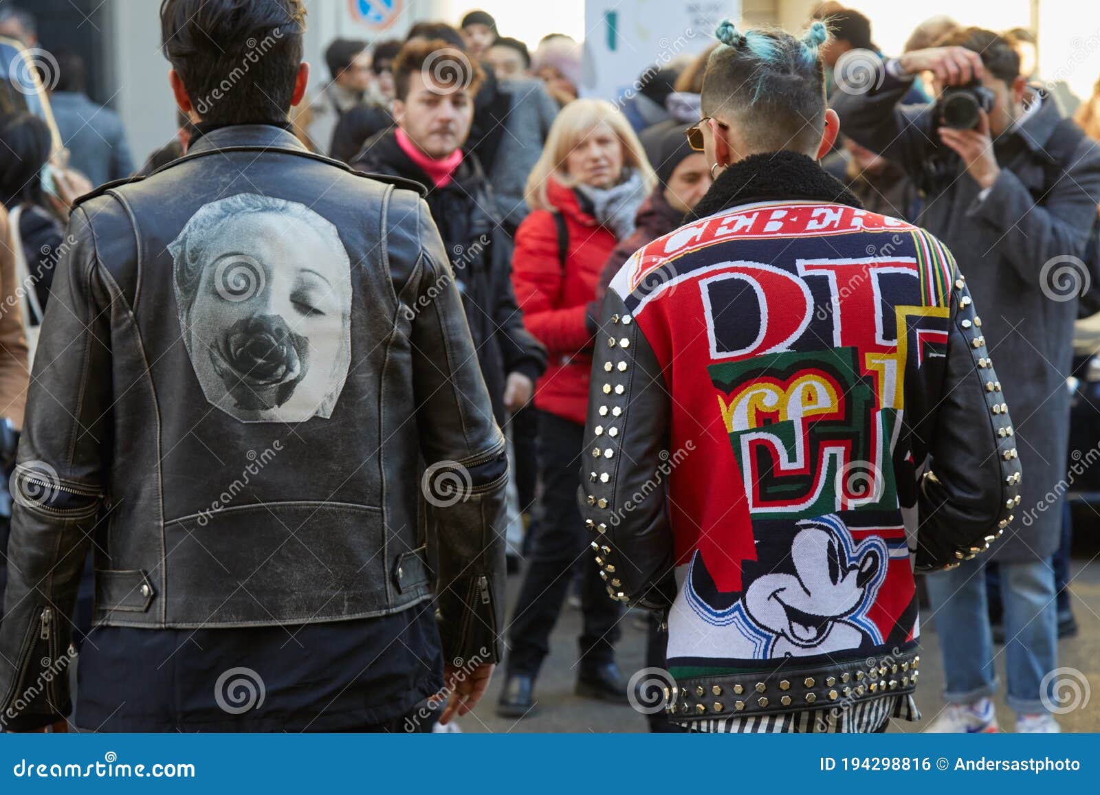 MILAN, ITALY - JANUARY 13, 2019: Man with red Spider Man coat and Louis  Vuitton phone cover and dog bag before John Richmond fashion show, Milan  Fashi Stock Photo - Alamy
