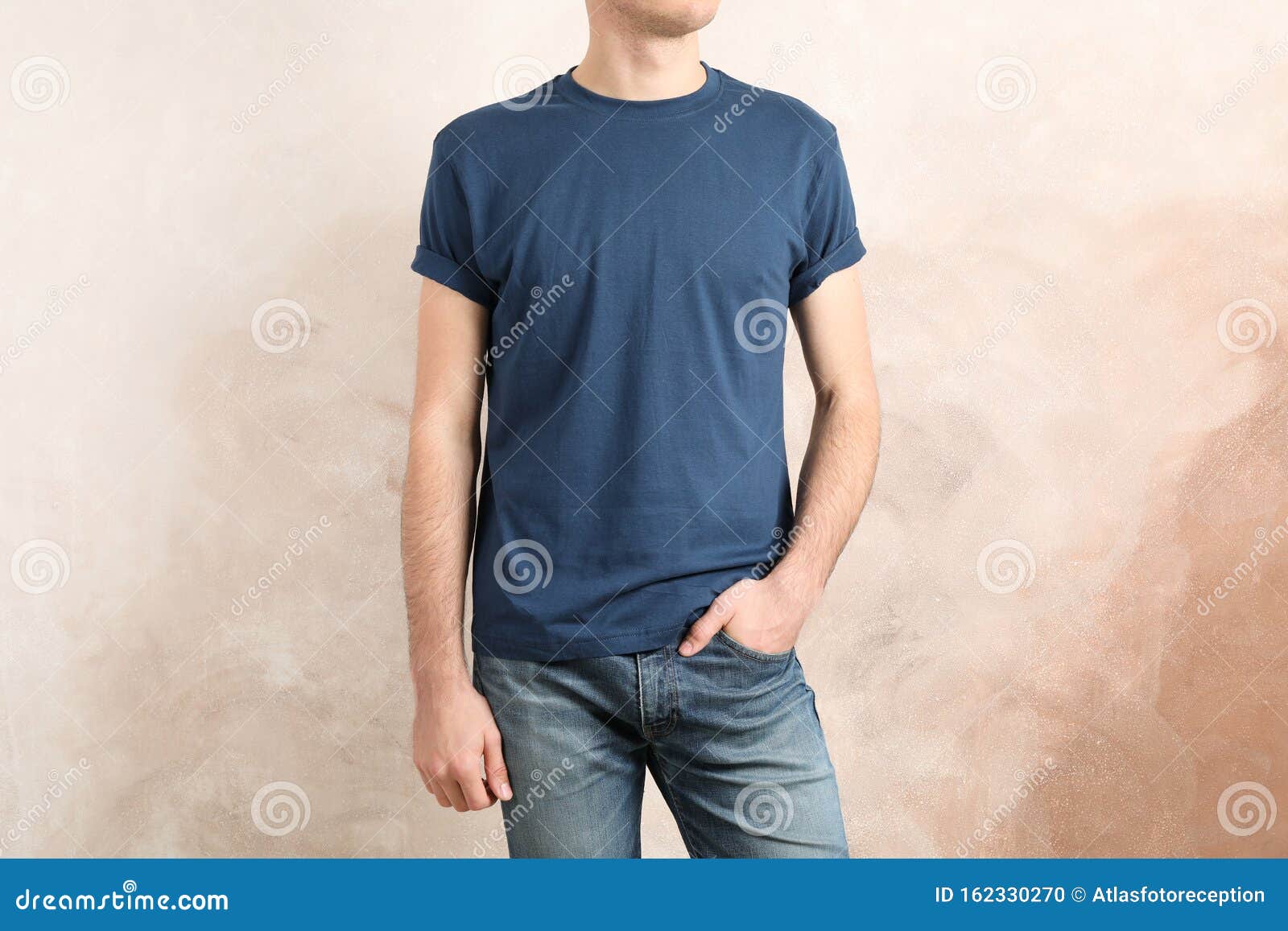 Men in Blank Blue T-shirt Against Brown Background Stock Photo - Image ...