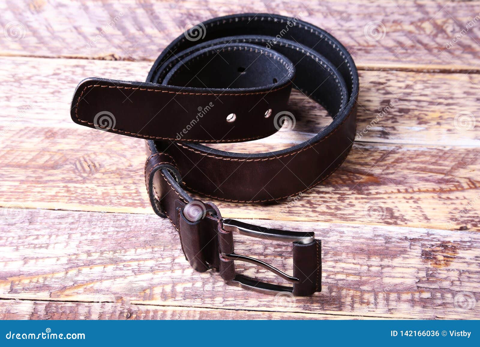 Men Elegance Leather Belt on Wooden Table. Stock Photo - Image of ...