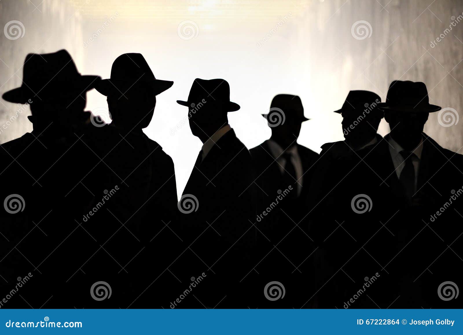 men in fedora hats silhouette. security, privacy, surveillance concept.