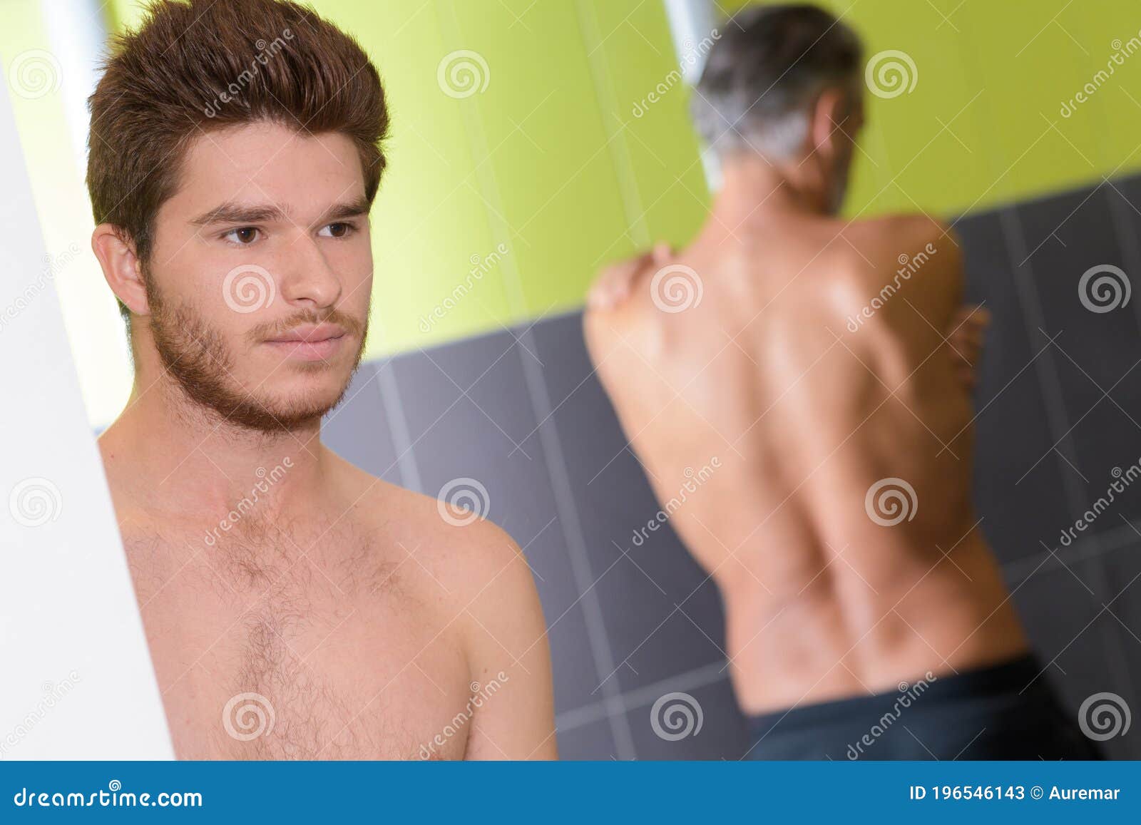 Men at gym shower area stock image. Image of sport, wall 196546143